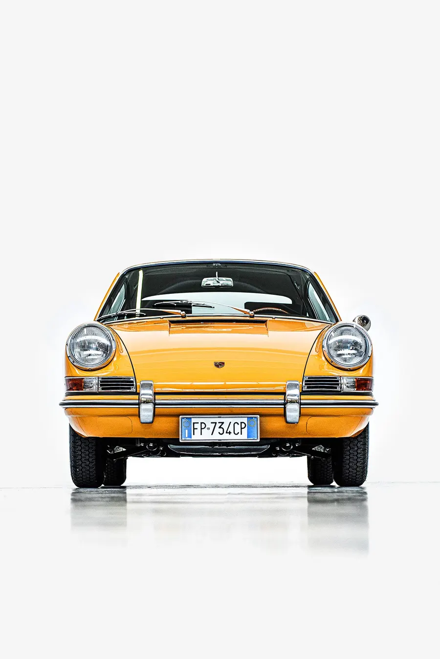 Porsche 911 short wheelbase parked in dramatic natural light