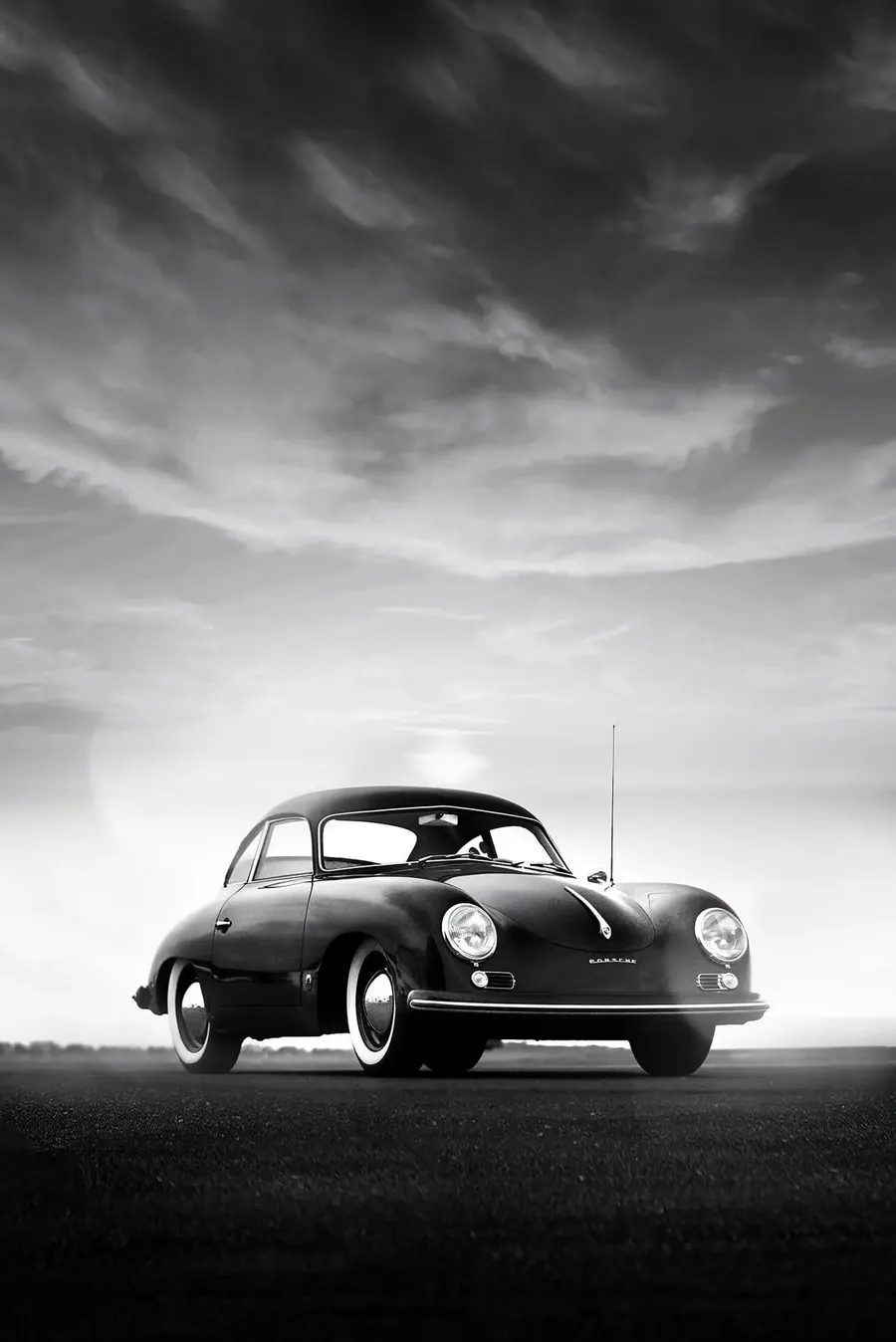 Black and white portrait of a classic Porsche 356